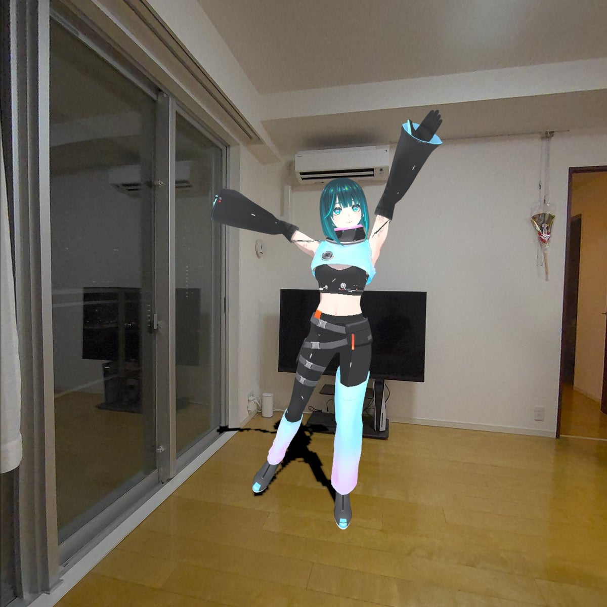 現実の部屋に3DキャラクターがMRで表示されているライブ配信の様子